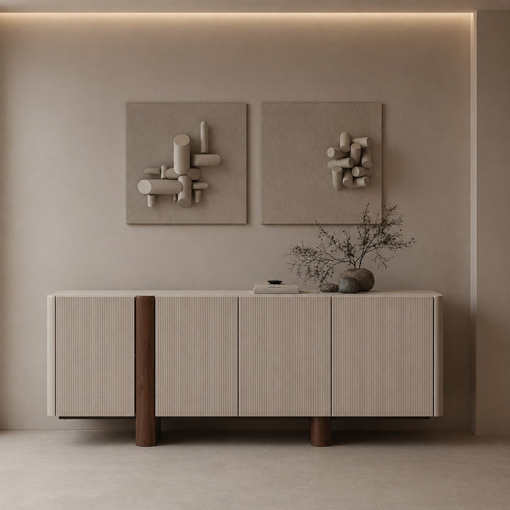 Modern interior with a sideboard, abstract wall art, and decorative elements.