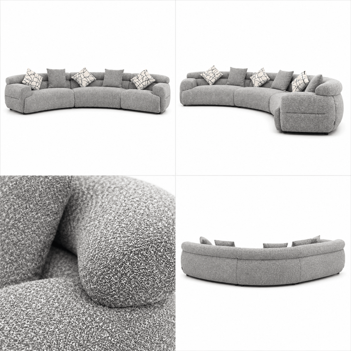 Gray sectional sofa with patterned cushions on a white background