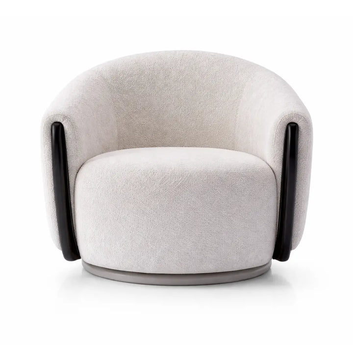 Modern armchair with light gray upholstery and black armrests on a white background