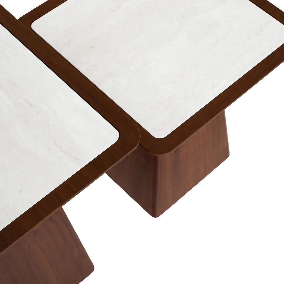 Close-up of a coffee table with marble top and wooden legs on a white background