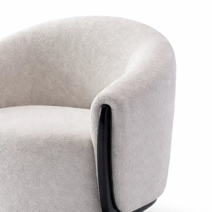 Close-up of a gray armchair with a white background