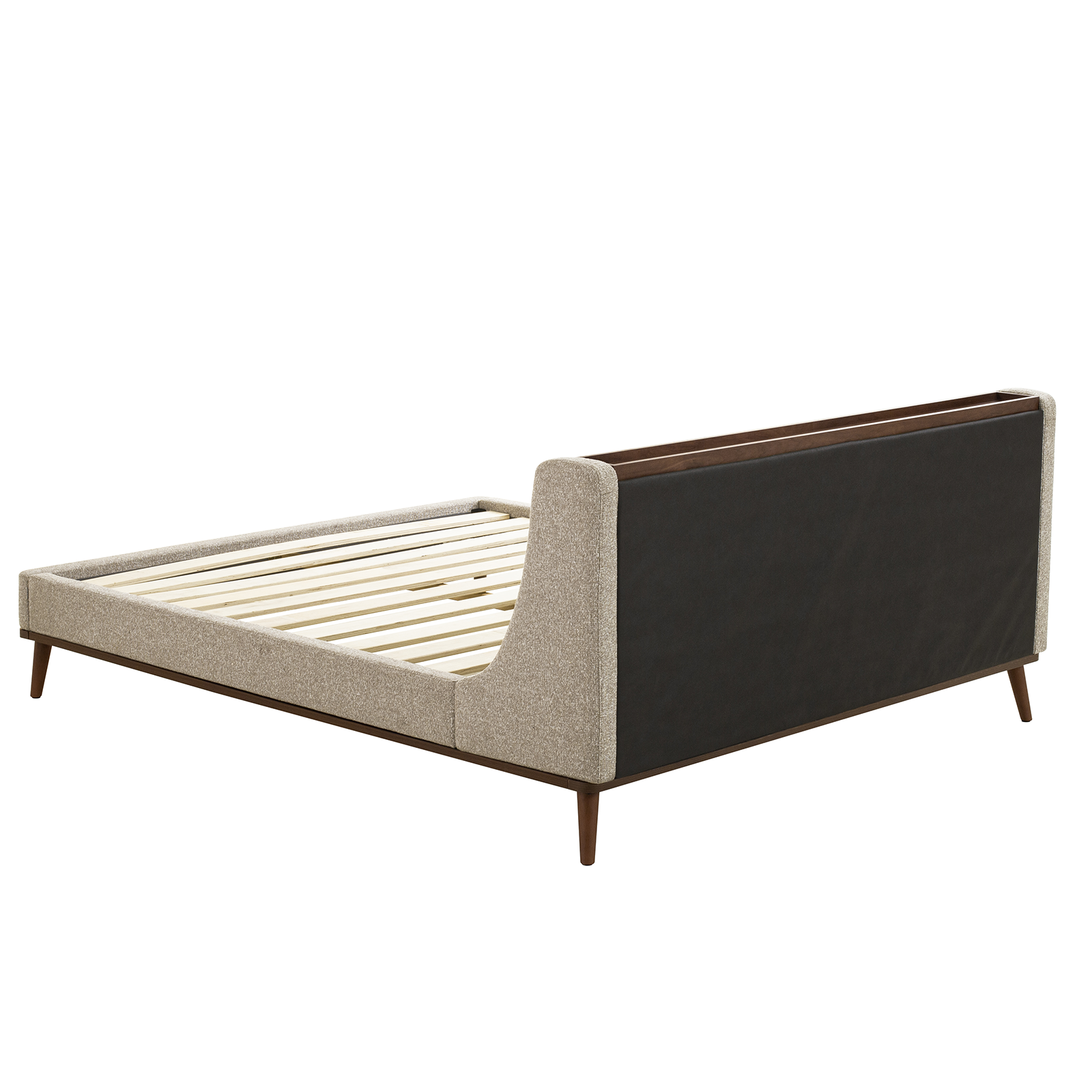 Bed with a dark headboard and light frame on a white background