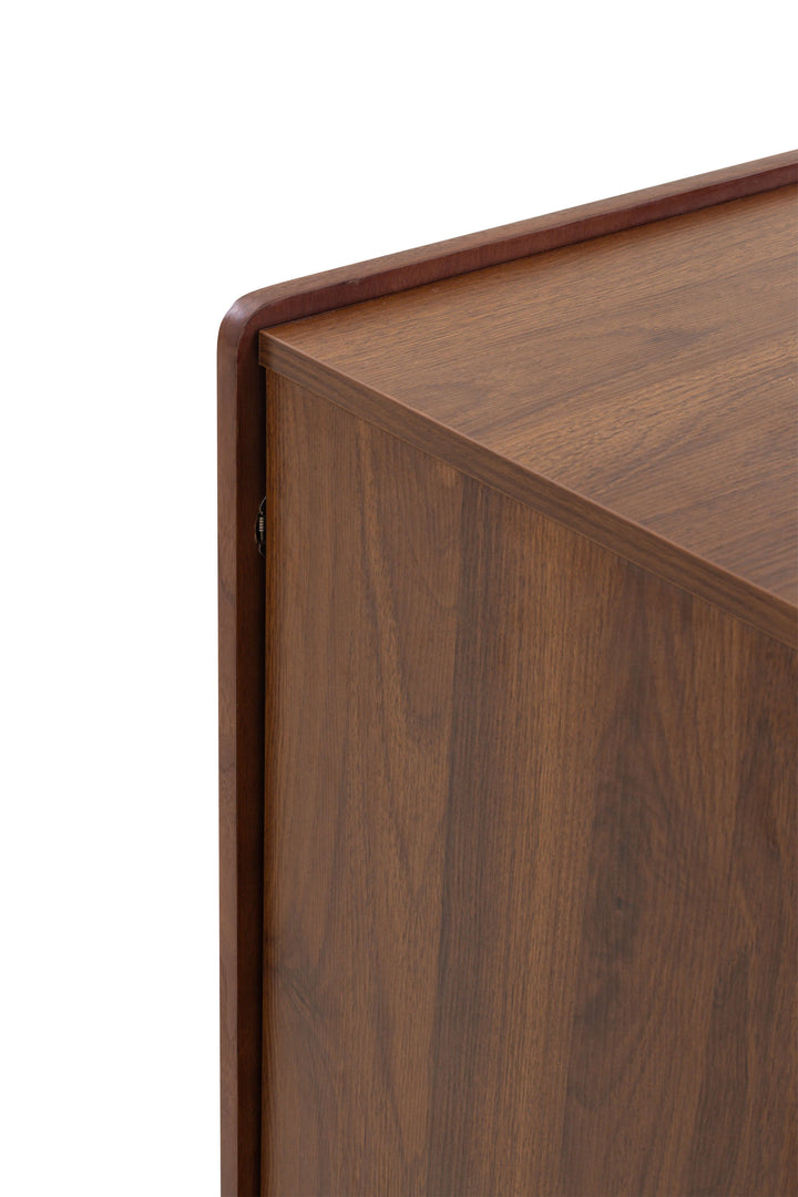 Close-up of a wooden surface with a visible grain pattern on a white background