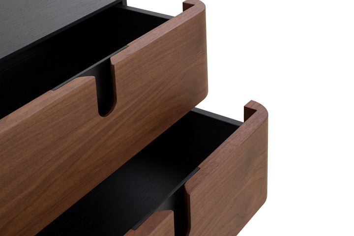 Wooden drawer with black interior on a white background