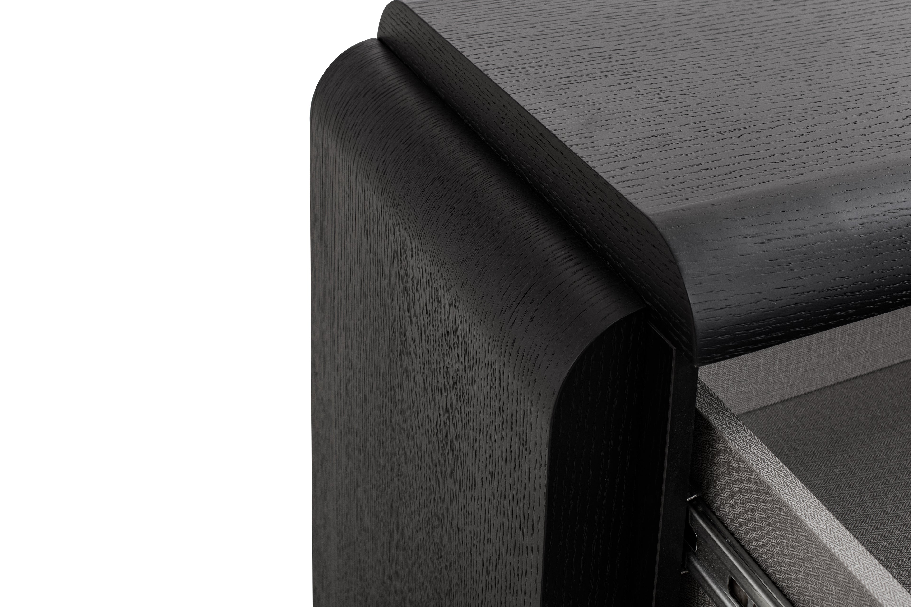 Close-up of a wooden desk corner with a white background