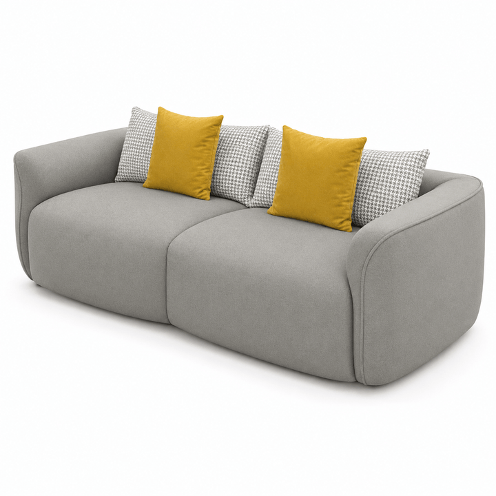 Gray sofa with yellow and patterned cushions on a white background