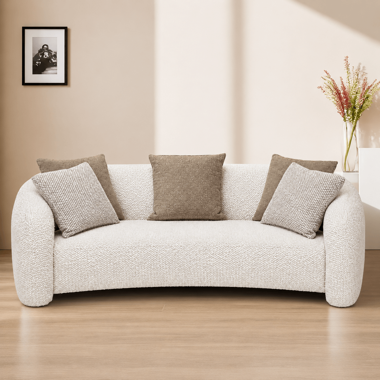 White sofa with gray cushions in a living room setting