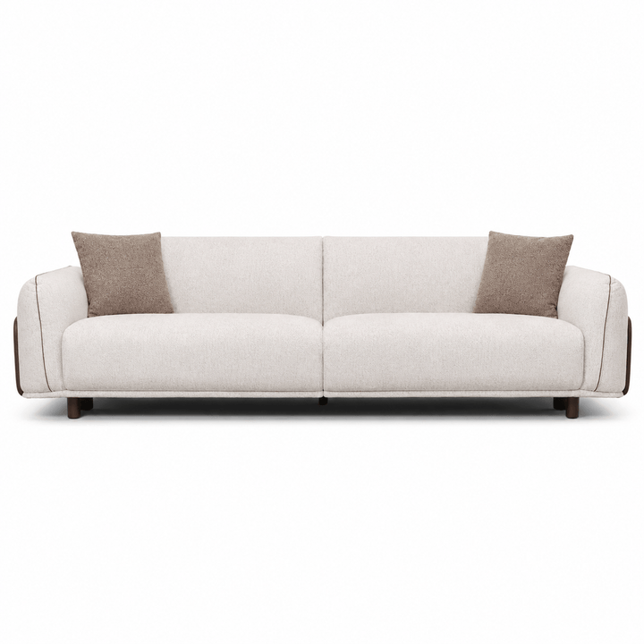 White sofa with brown cushions on a white background