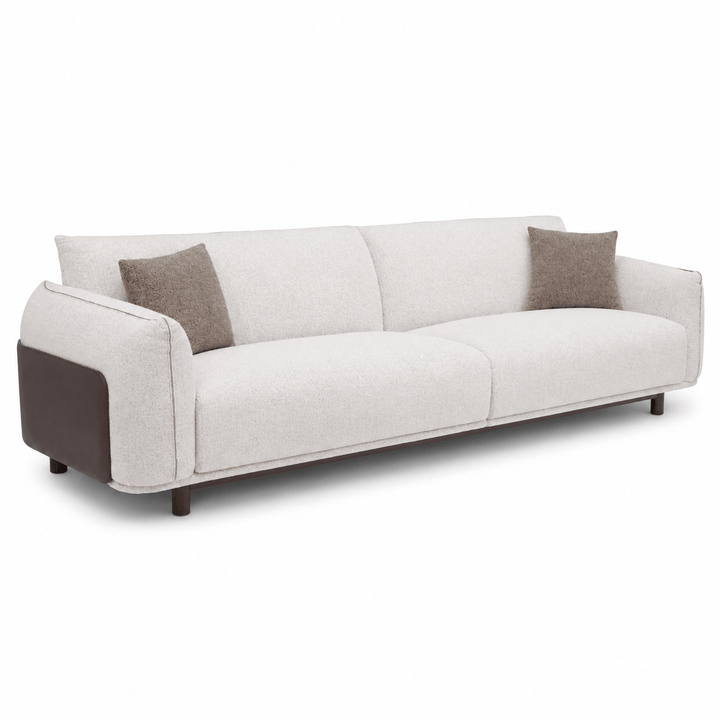 White sofa with brown cushions on a white background