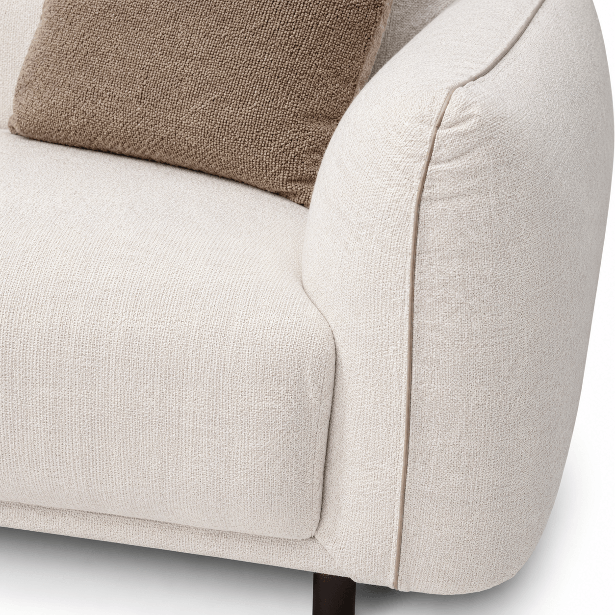 Close-up of a beige armchair with a brown cushion on a white background