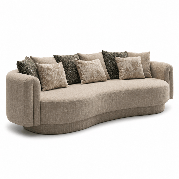Beige sofa with patterned cushions on a white background