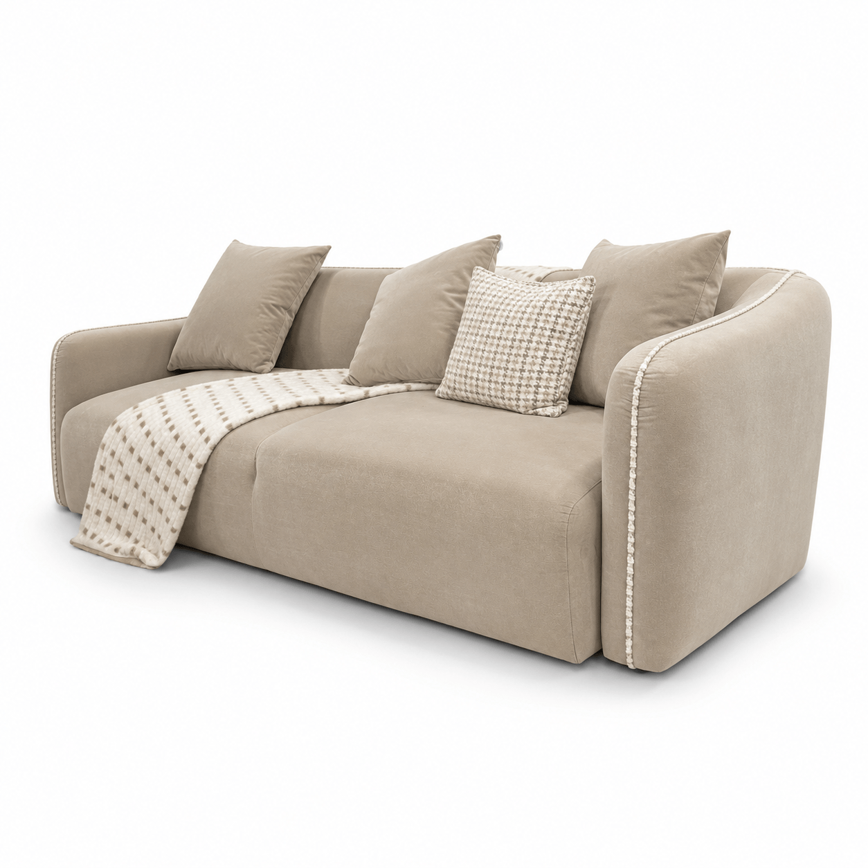 Beige sofa with cushions and a blanket on a white background