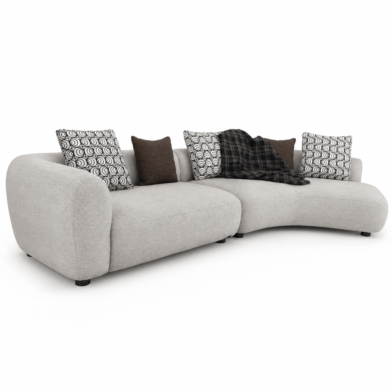 Gray sectional sofa with patterned and solid color cushions on a white background