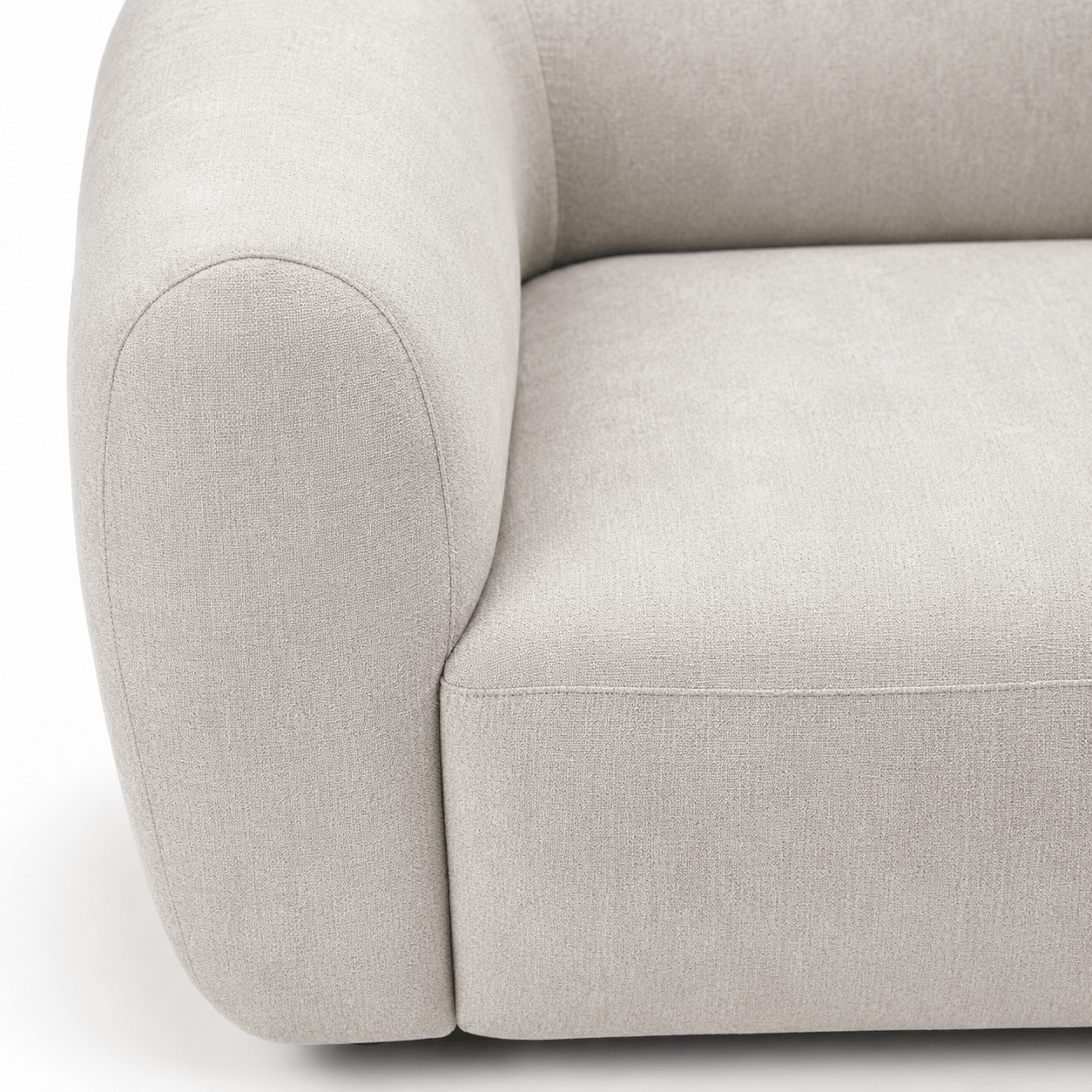 Close-up of a light gray sofa on a white background