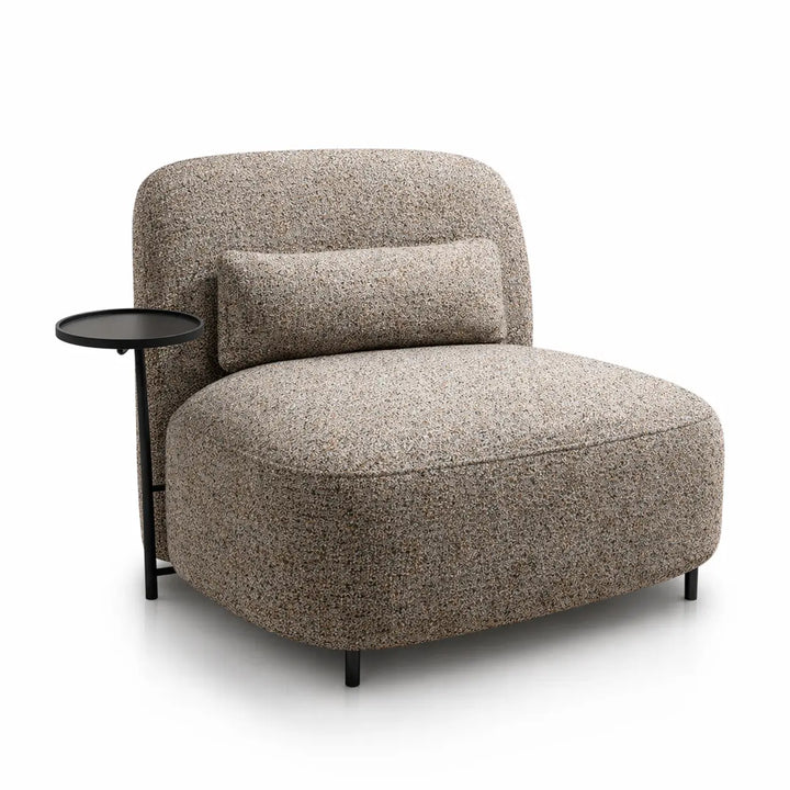 Beige armchair with a small side table on a white background