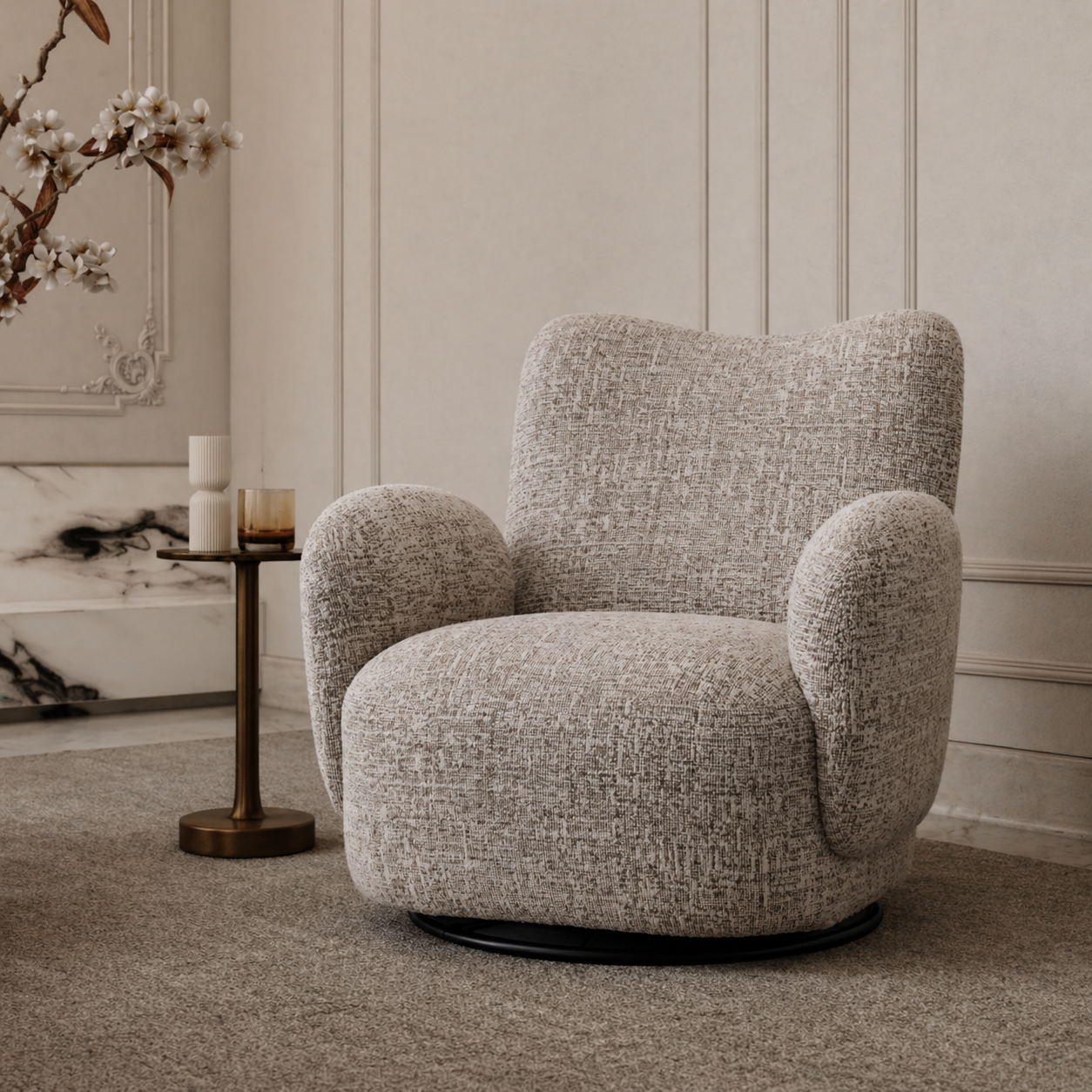 Gray armchair in a stylish room with decorative elements.