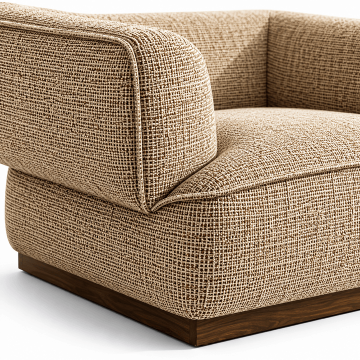 Beige textured sofa with wooden legs on a white background