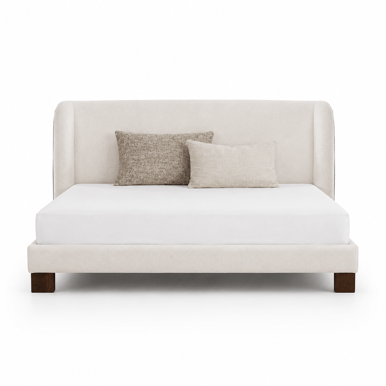 Beige upholstered bed with white mattress and two pillows on a white background