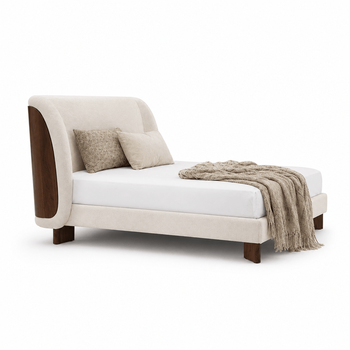 Beige upholstered bed with white mattress and brown blanket on a white background