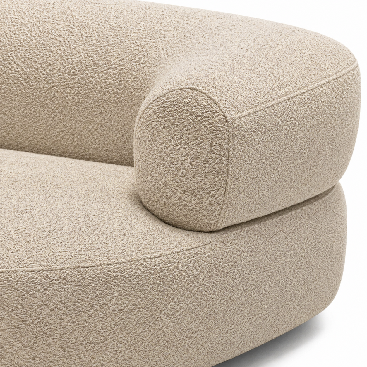 Close-up of a textured beige armchair on a white background