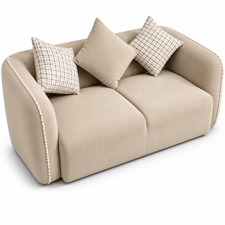 Beige sofa with decorative pillows on a white background
