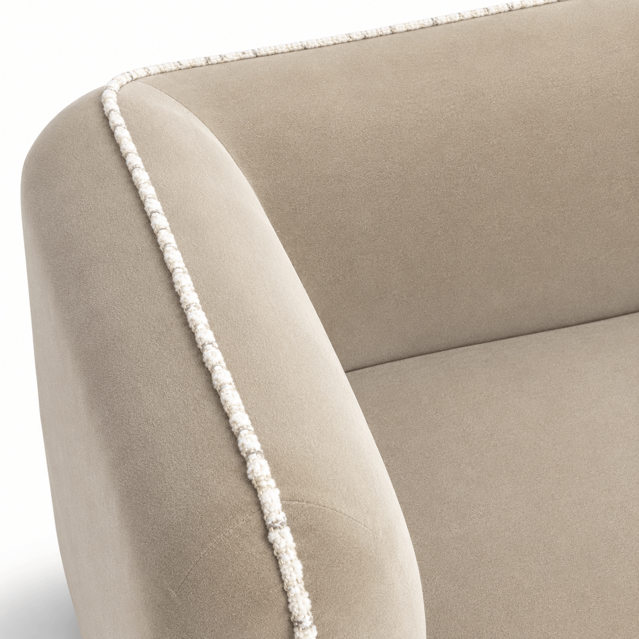 Close-up of a beige sofa with decorative white trim on a white background