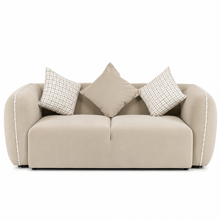 Beige sofa with decorative pillows on a white background