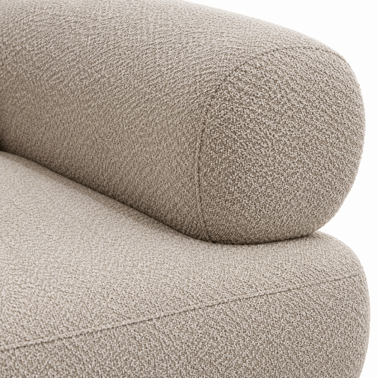 Close-up of a textured beige sofa cushion on a white background