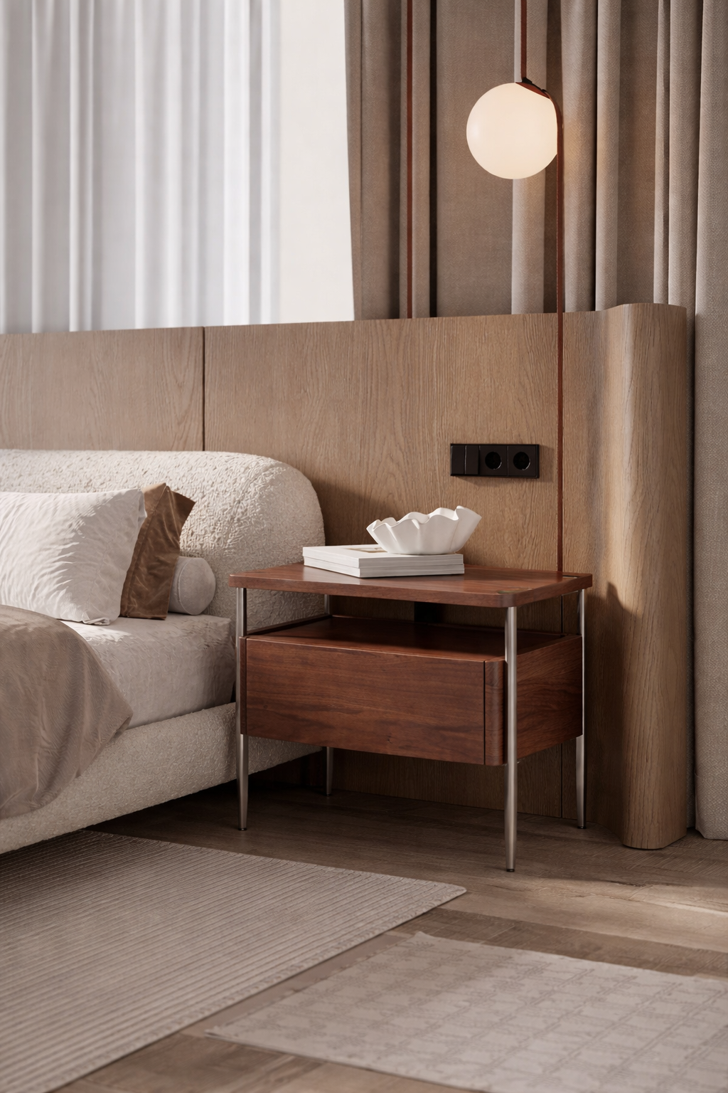 Modern bedroom with wooden nightstand, bed, and lamp.