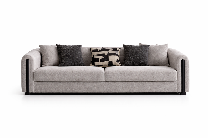 Gray sofa with decorative pillows on a white background